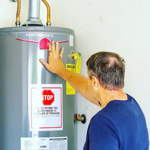Plumbers work by Scott Alan Plumbing and Heating Ltd. in Kelowna