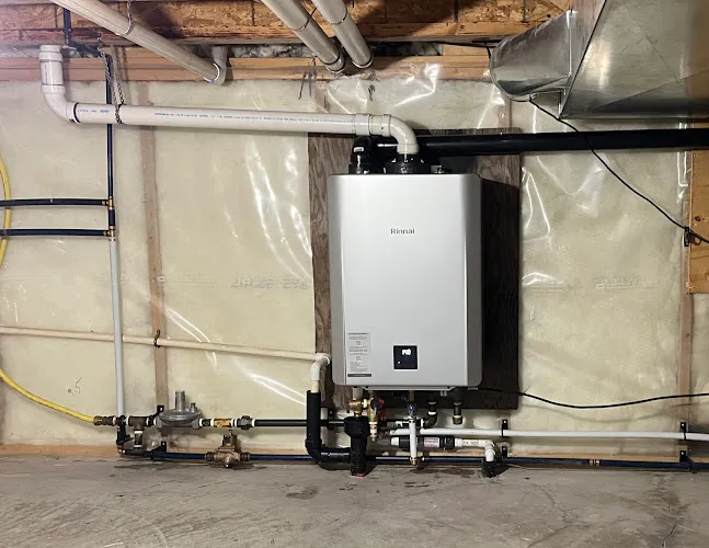 Plumbers work by Winter Plumbing & Heating Ltd. in Kelowna
