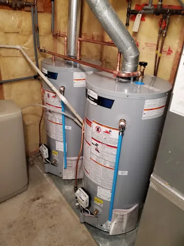Plumbers work by Wiener's Plumbing & Drain Cleaning Inc. in Kelowna